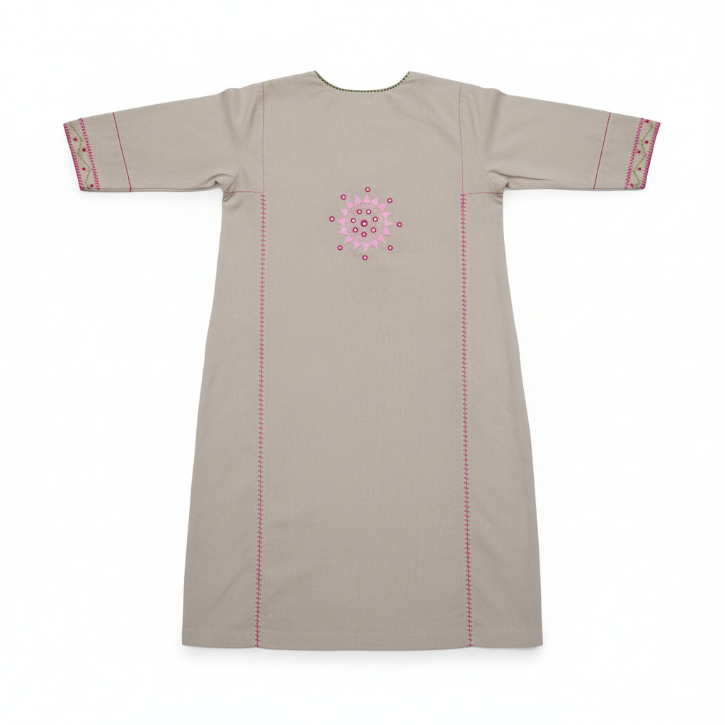 Beige dress with pink floral embroidery on a white background